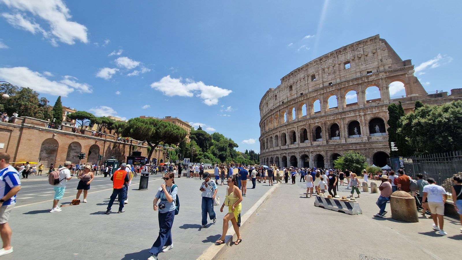 Tourists visiting the Colosseum in Rome, Italy